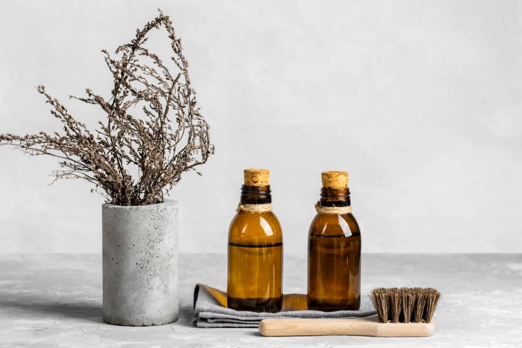 Hair regrowth supplements and treatments on wooden surface - regrowing hair after menopause